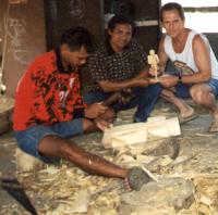 watching the carving of a wood abstract