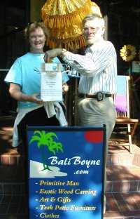 Marilyn & Larry select the winning entry