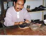 Wayan making silver rings