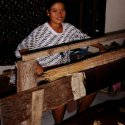 Komang at her loom